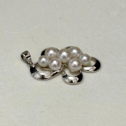 Akoya pearl necklace with baby pearls measuring approximately 4.5-5.6mm in size