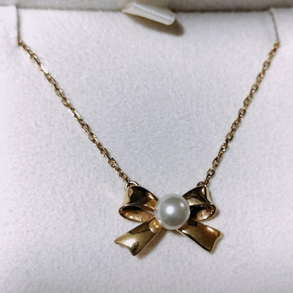 Mikimoto Pearl Ribbon Necklace with 5.0mm Akoya pearls on 18K yellow gold chain, 40cm length
