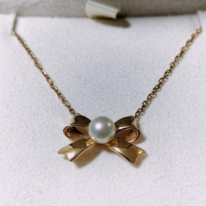 Mikimoto Pearl Ribbon Necklace with 5.0mm Akoya pearls on 18K yellow gold chain, 40cm length