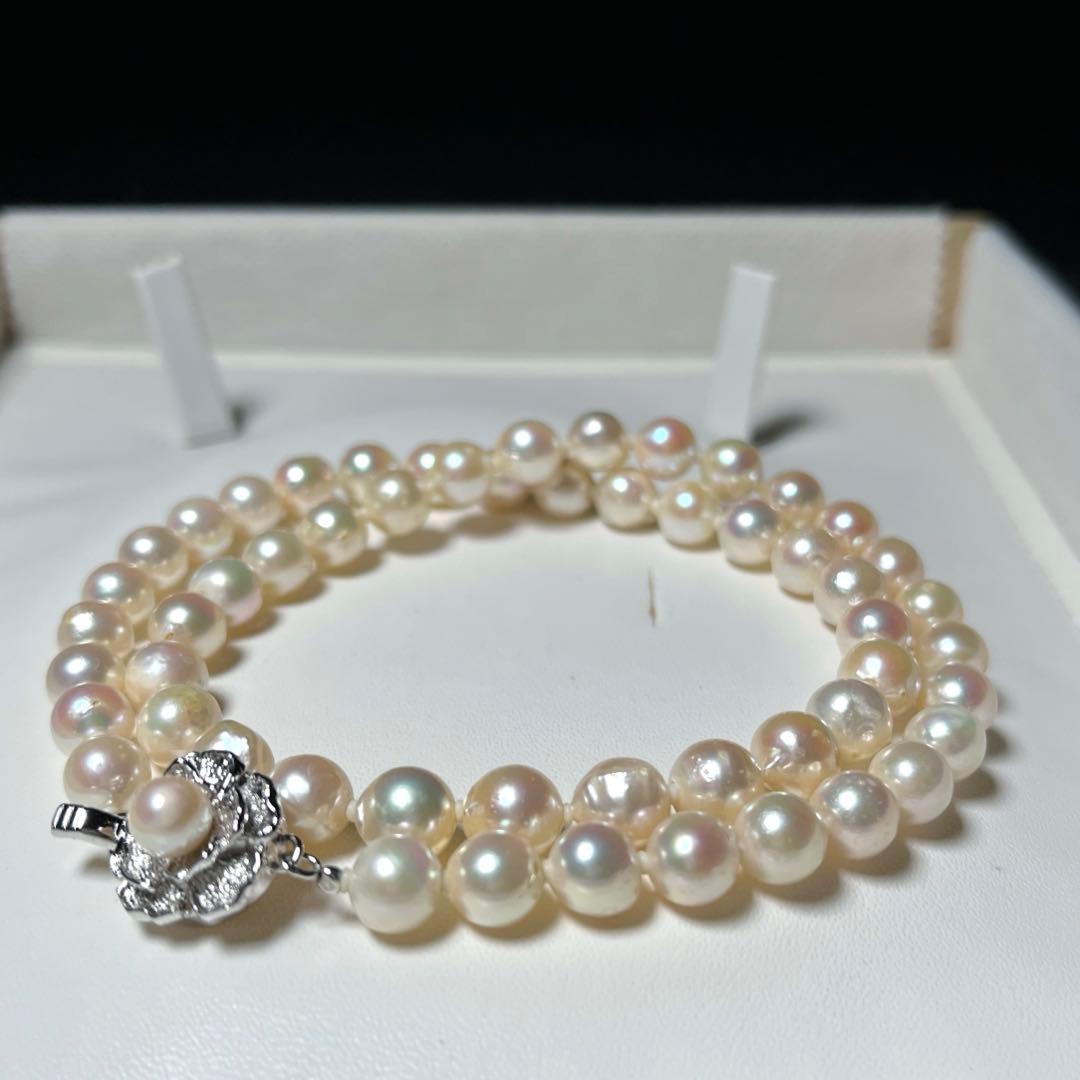Akoya pearl necklace featuring 7.0-7.4mm semi-baroque white pearls on a 44cm silver chain