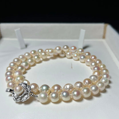 Akoya pearl necklace featuring 7.0-7.4mm semi-baroque white pearls on a 44cm silver chain