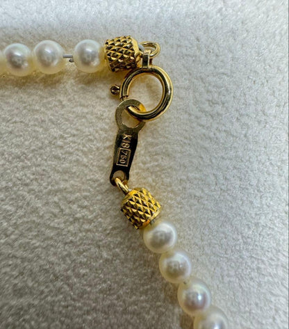 K18 Akoya Pearl Baby Pearl Necklace featuring a single 7.5mm genuine pearl pendant on a delicate chain