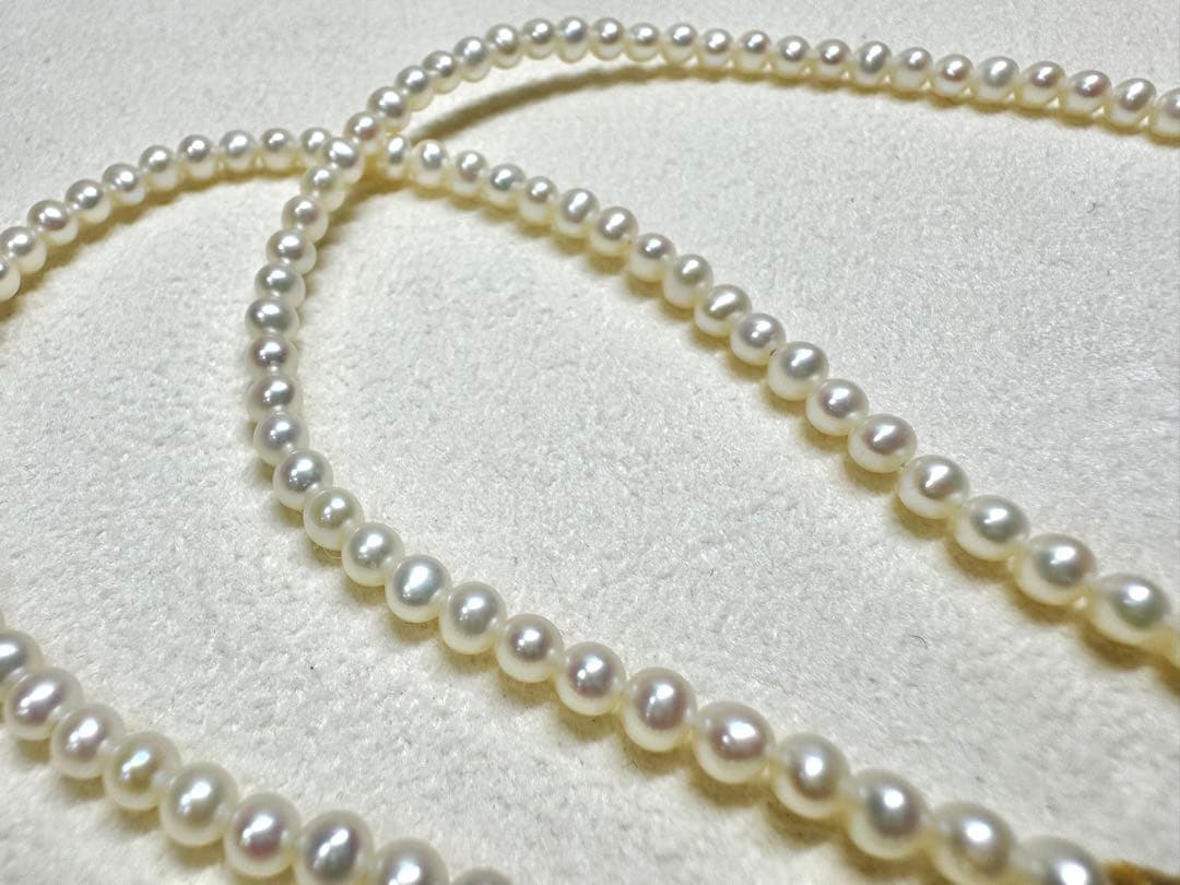 K18 Akoya Pearl Baby Pearl Necklace featuring a single 7.5mm genuine pearl pendant on a delicate chain