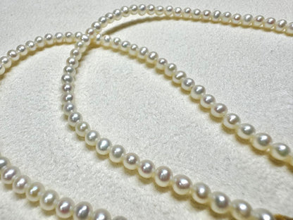 K18 Akoya Pearl Baby Pearl Necklace featuring a single 7.5mm genuine pearl pendant on a delicate chain