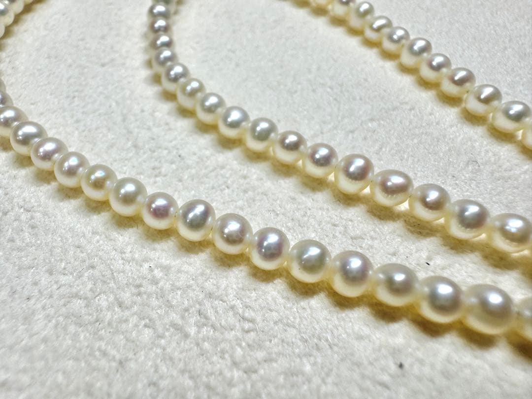 K18 Akoya Pearl Baby Pearl Necklace featuring a single 7.5mm genuine pearl pendant on a delicate chain