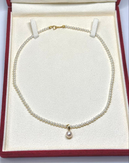 K18 Akoya Pearl Baby Pearl Necklace featuring a single 7.5mm genuine pearl pendant on a delicate chain