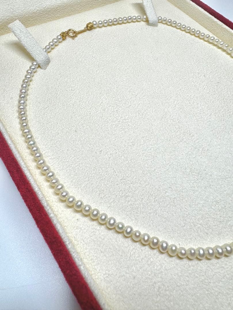 K18 Akoya Pearl Baby Pearl Necklace featuring a single 7.5mm genuine pearl pendant on a delicate chain