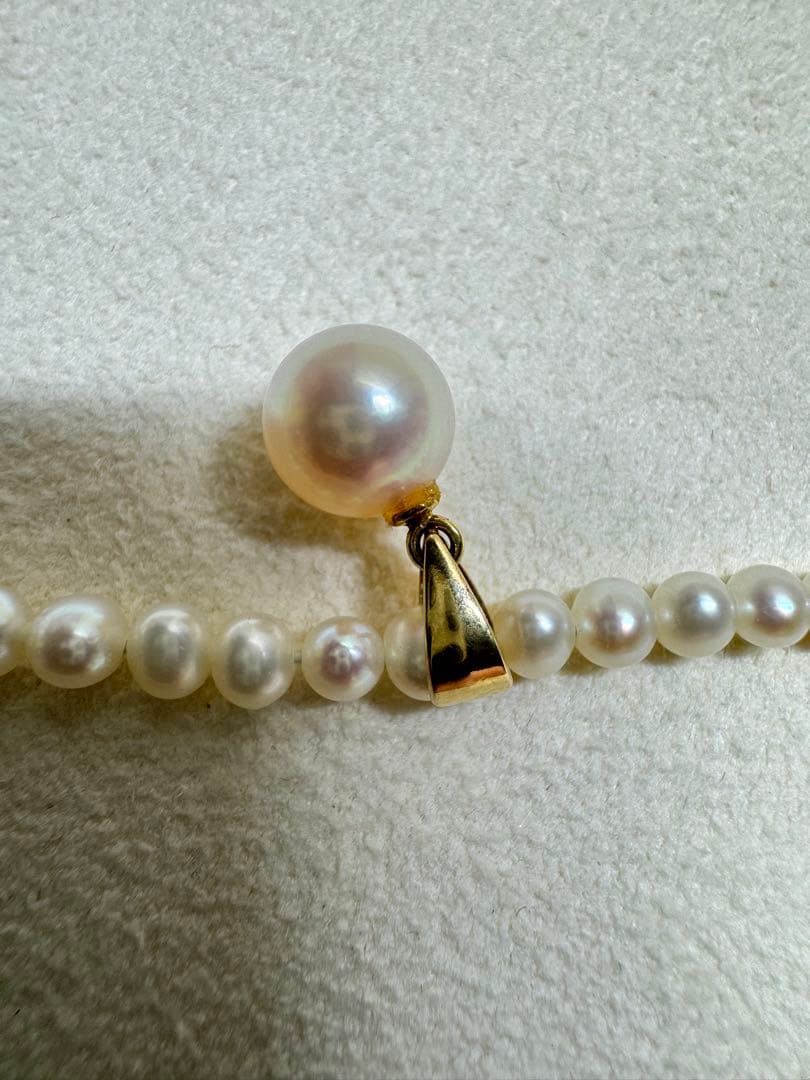 K18 Akoya Pearl Baby Pearl Necklace featuring a single 7.5mm genuine pearl pendant on a delicate chain