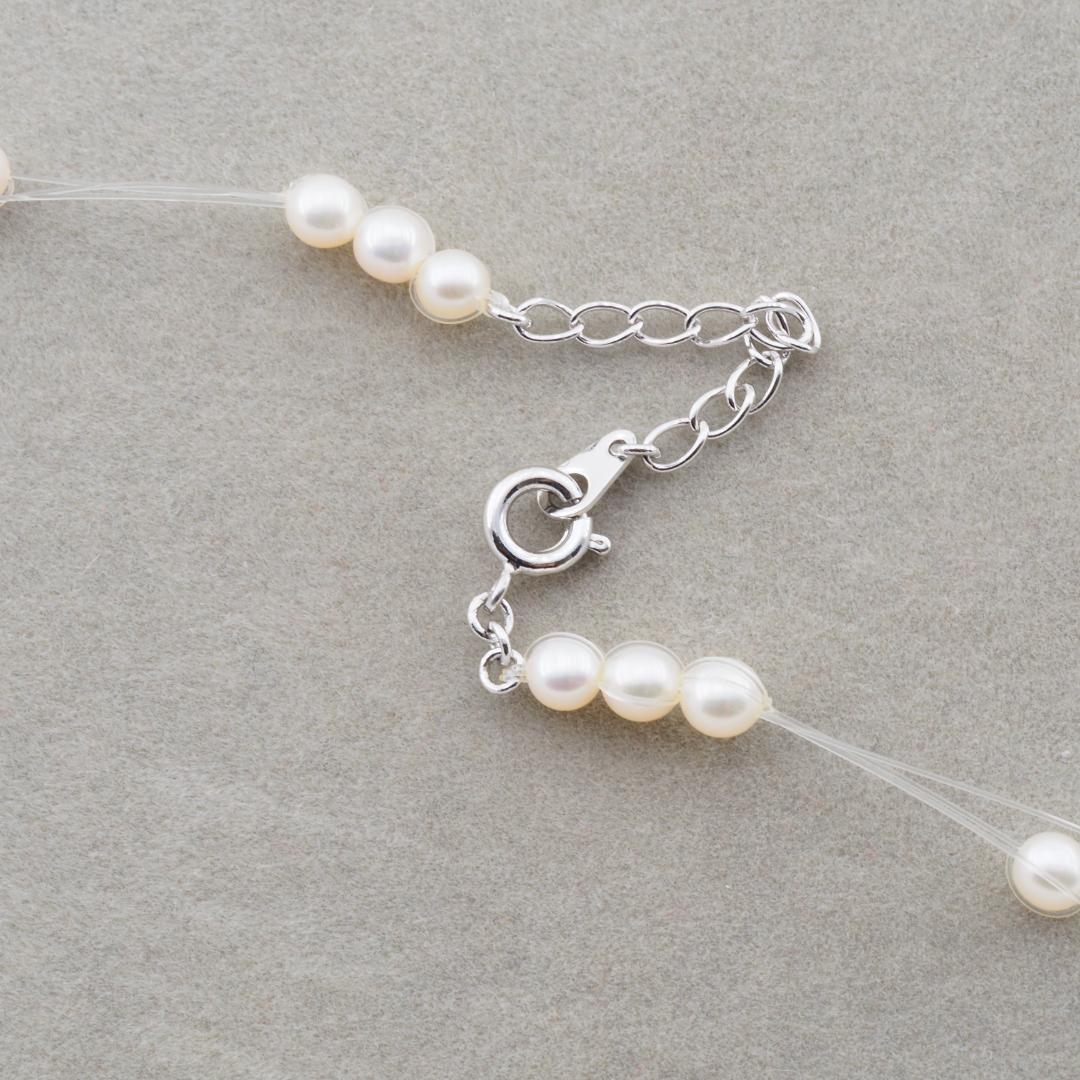 Tasaki pearl necklace with 4.0mm pearls on adjustable 39-43cm chain featuring wire box and warranty