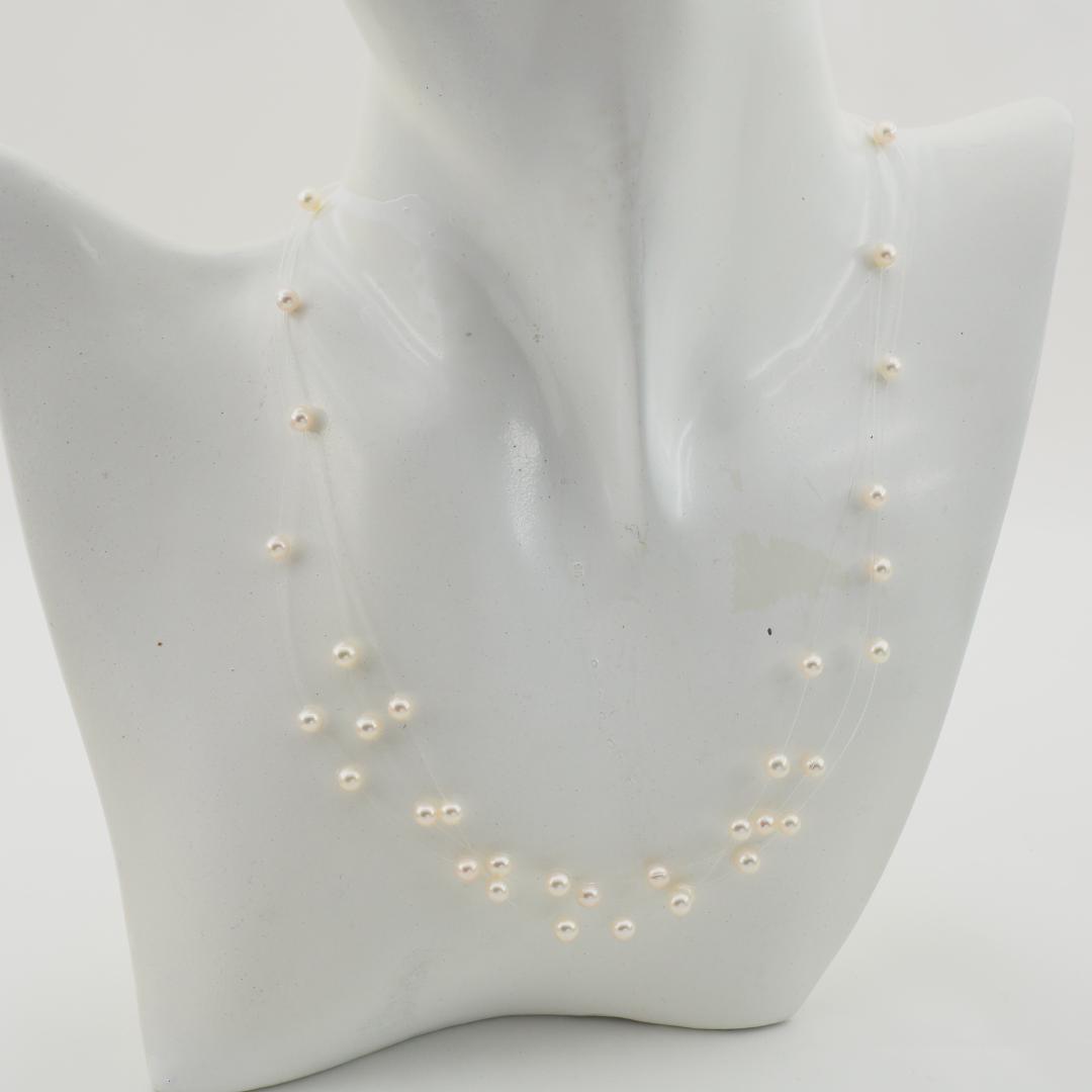 Tasaki pearl necklace with 4.0mm pearls on adjustable 39-43cm chain featuring wire box and warranty