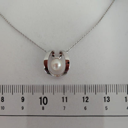 TASAKI silver pearl necklace measuring 43cm with delicate pearls and sleek silver chain