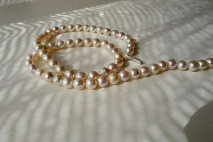 Akoya Pearl Baroque Necklace with pink 8.4-7.6mm pearls on 61cm gold and silver chain from Japan