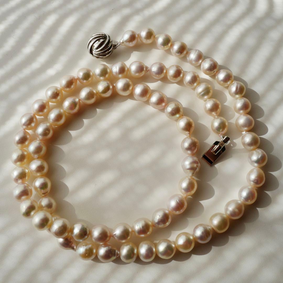Akoya Pearl Baroque Necklace with pink 8.4-7.6mm pearls on 61cm gold and silver chain from Japan