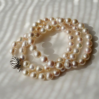Akoya Pearl Baroque Necklace with pink 8.4-7.6mm pearls on 61cm gold and silver chain from Japan