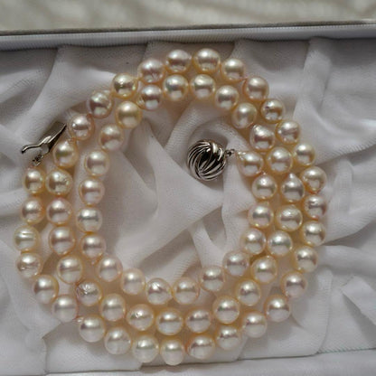 Akoya Pearl Baroque Necklace with pink 8.4-7.6mm pearls on 61cm gold and silver chain from Japan