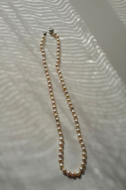 Akoya Pearl Baroque Necklace with pink 8.4-7.6mm pearls on 61cm gold and silver chain from Japan