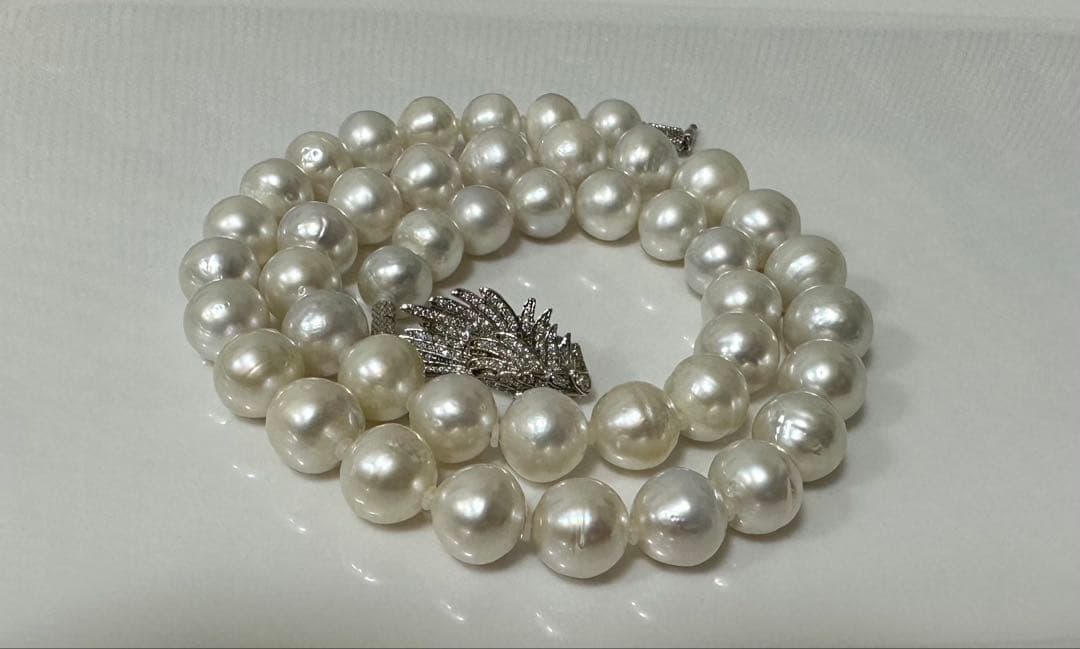 Nanyou white pearl necklace with pearls sized 10.7mm to 13.5mm, 59cm length, certified by Pearl Science Research Institute