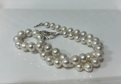 Nanyou white pearl necklace with pearls sized 10.7mm to 13.5mm, 59cm length, certified by Pearl Science Research Institute