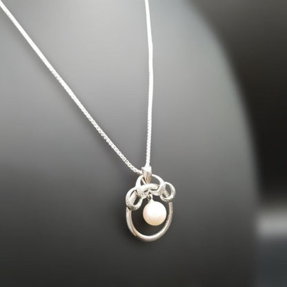 Mikimoto silver 925 necklace with 5mm genuine pearl and circle motif design in silver tone