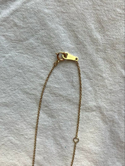 10K gold necklace with a pink agate diamond-shaped pendant measuring 9 mm stone and 13 mm top size