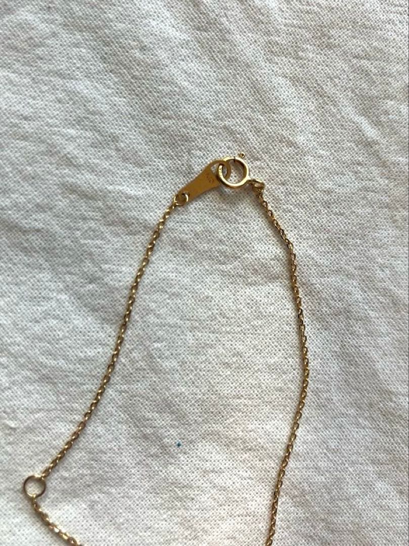 10K gold necklace with a pink agate diamond-shaped pendant measuring 9 mm stone and 13 mm top size