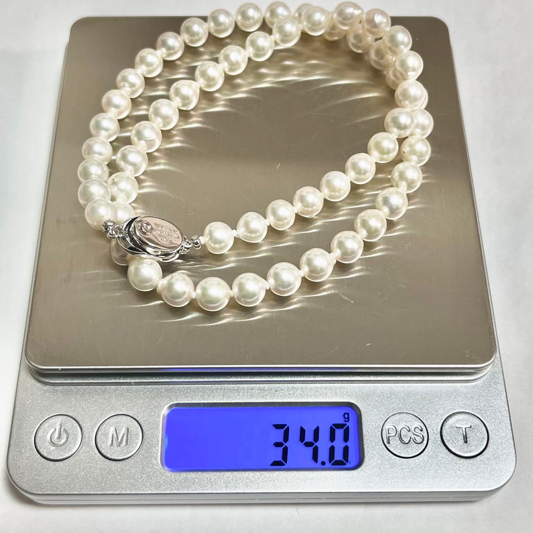 Akoya pearl necklace with 7.0-7.6mm pearls and silver stamp beans design, 46cm length