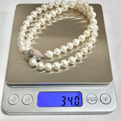 Akoya pearl necklace with 7.0-7.6mm pearls and silver stamp beans design, 46cm length