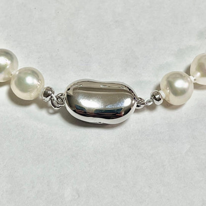 Akoya pearl necklace with 7.0-7.6mm pearls and silver stamp beans design, 46cm length