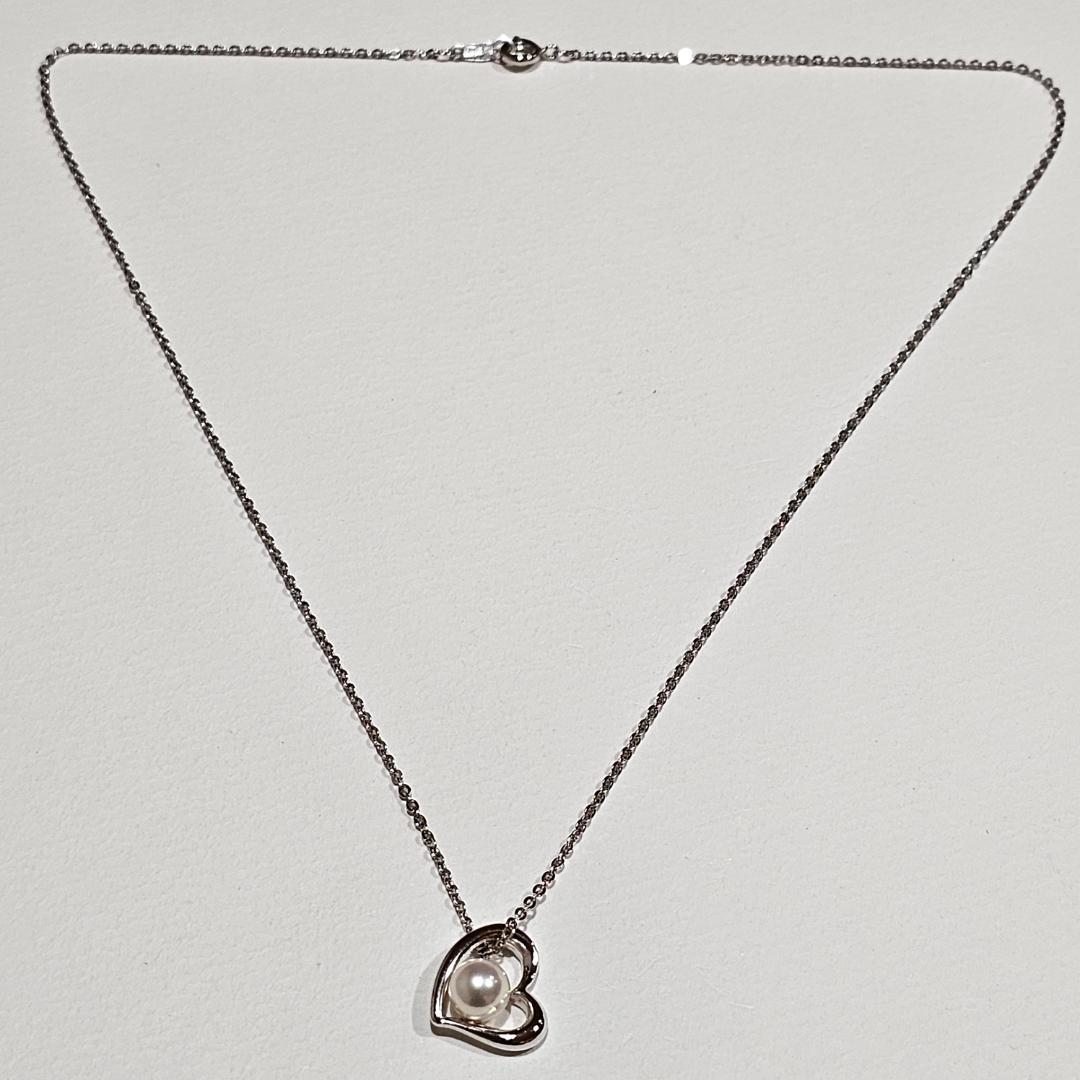 Tasaki pearl necklace with 6.6mm pearl on 45cm SV925 sterling silver chain featuring a heart motif