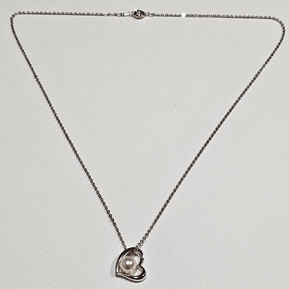 Tasaki pearl necklace with 6.6mm pearl on 45cm SV925 sterling silver chain featuring a heart motif