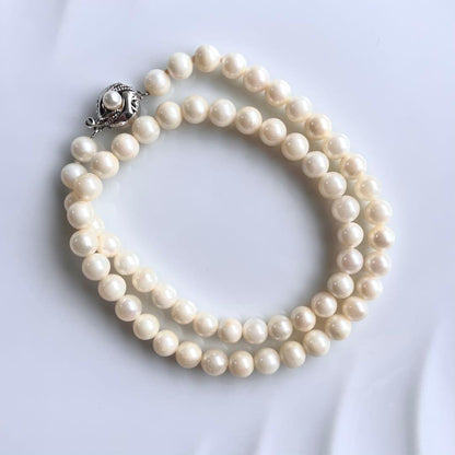 Akoya pearl necklace with 6.5 to 7mm white pearls on silver chain with silver clasp
