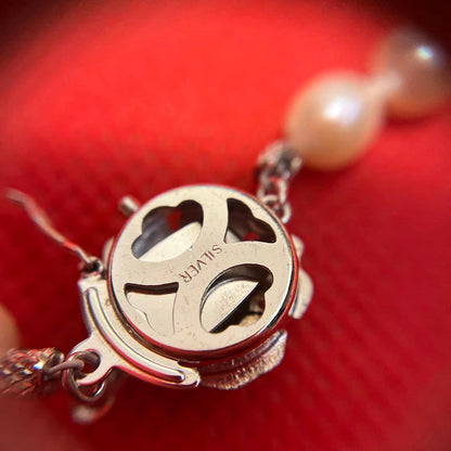 Vintage true pearl necklace featuring 4 cm length and 0.6 to 0.7 cm diameter pearls