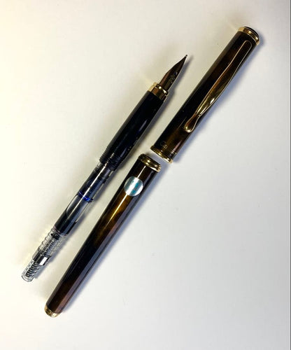 PILOT Cavalier fountain pen in black and brown marble pattern with medium nib, capped, 141mm length