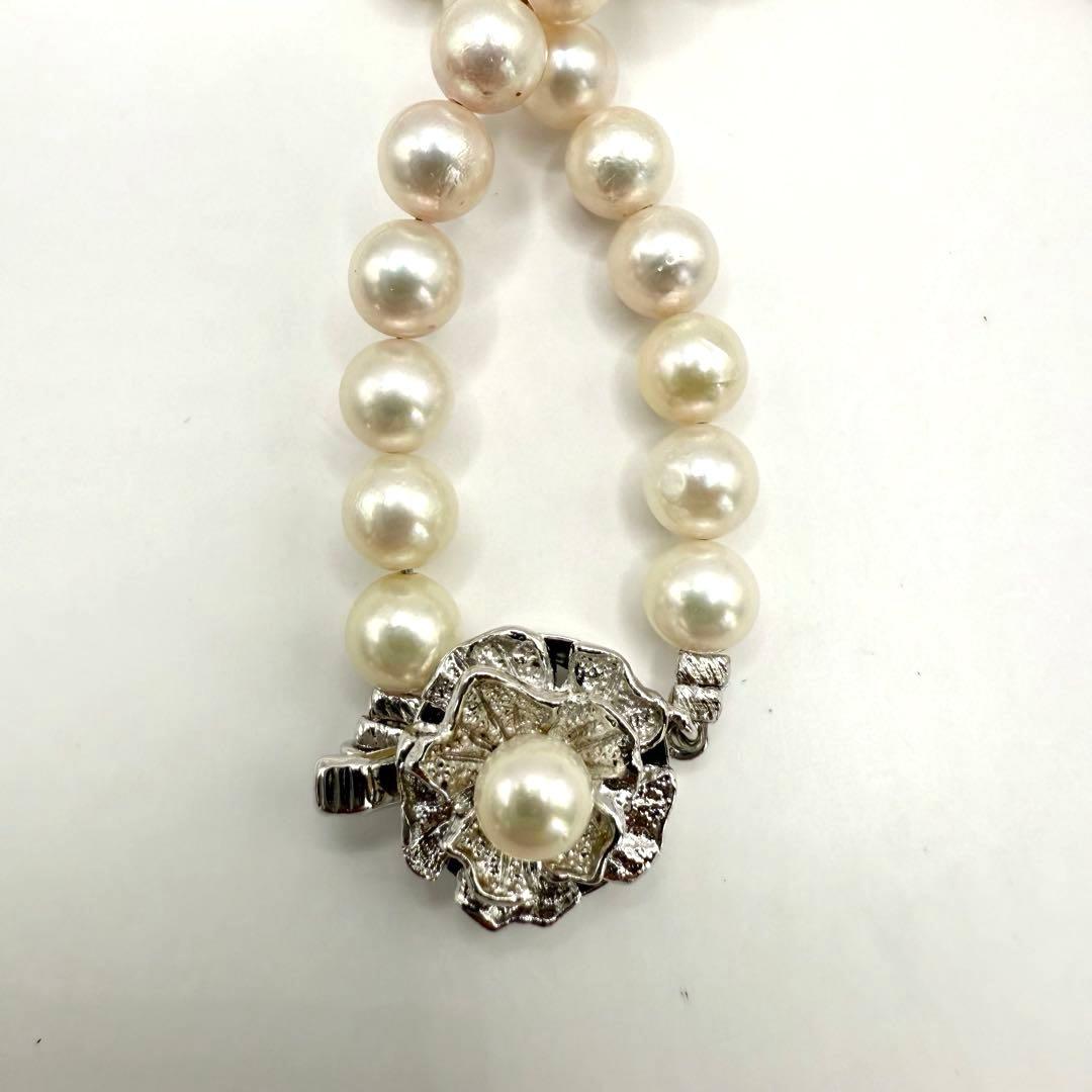 Yamato Akoya pearl necklace with 6mm pearls measuring 42cm displayed on a white background