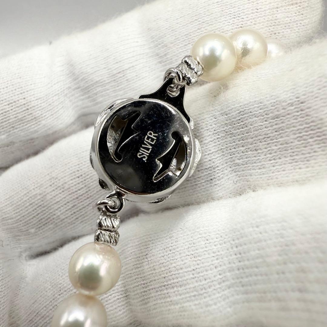 Yamato Akoya pearl necklace with 6mm pearls measuring 42cm displayed on a white background