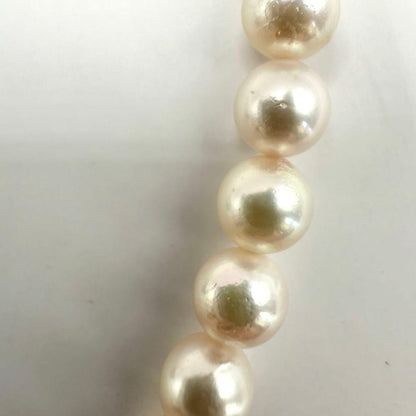 Yamato Akoya pearl necklace with 6mm pearls measuring 42cm displayed on a white background