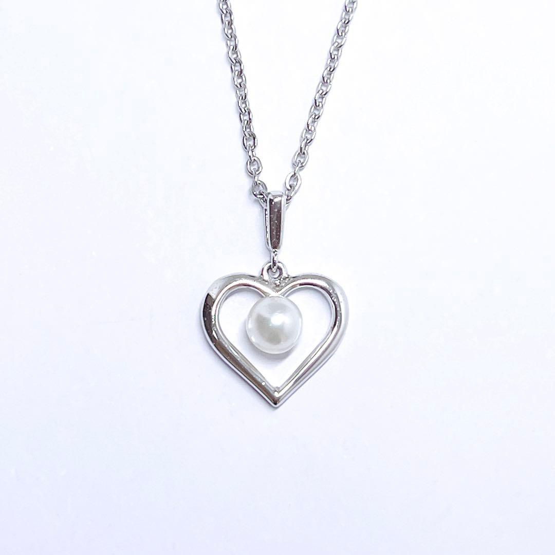 Mikimoto pearl necklace with 4.4mm pearls and silver heart pendant on a 39cm chain