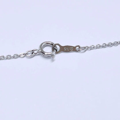 Mikimoto pearl necklace with 4.4mm pearls and silver heart pendant on a 39cm chain
