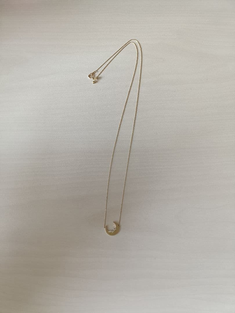 Agete gold necklace with 0.05ct diamond moon pendant on 55cm yellow gold chain