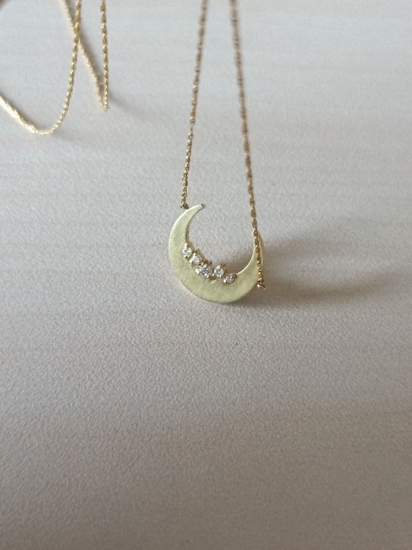 Agete gold necklace with 0.05ct diamond moon pendant on 55cm yellow gold chain