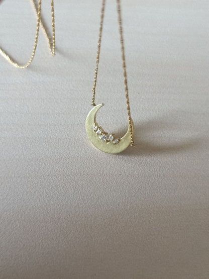 Agete gold necklace with 0.05ct diamond moon pendant on 55cm yellow gold chain