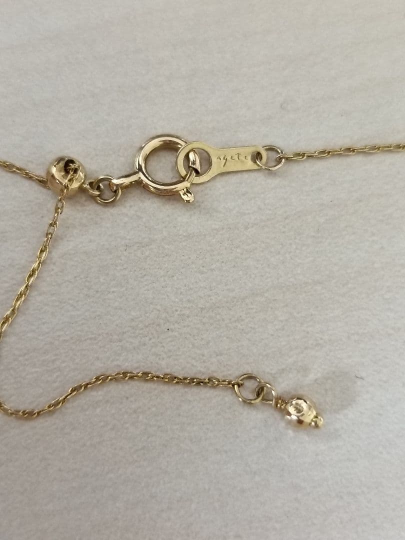 Agete gold necklace with 0.05ct diamond moon pendant on 55cm yellow gold chain
