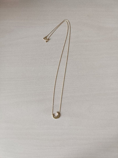 Agete gold necklace with 0.05ct diamond moon pendant on 55cm yellow gold chain