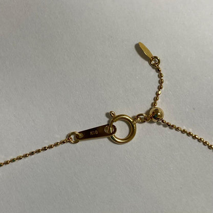 K18YG Akoya Pearl Y-shaped Necklace with cut ball chain and two Akoya pearls, one movable, on white background