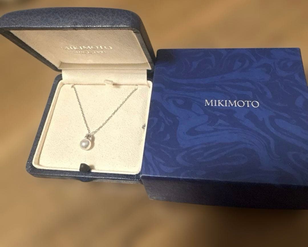 MIKIMOTO K18WG necklace with a single white pearl pendant on a delicate white gold chain
