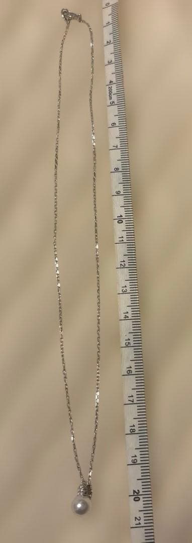MIKIMOTO K18WG necklace with a single white pearl pendant on a delicate white gold chain
