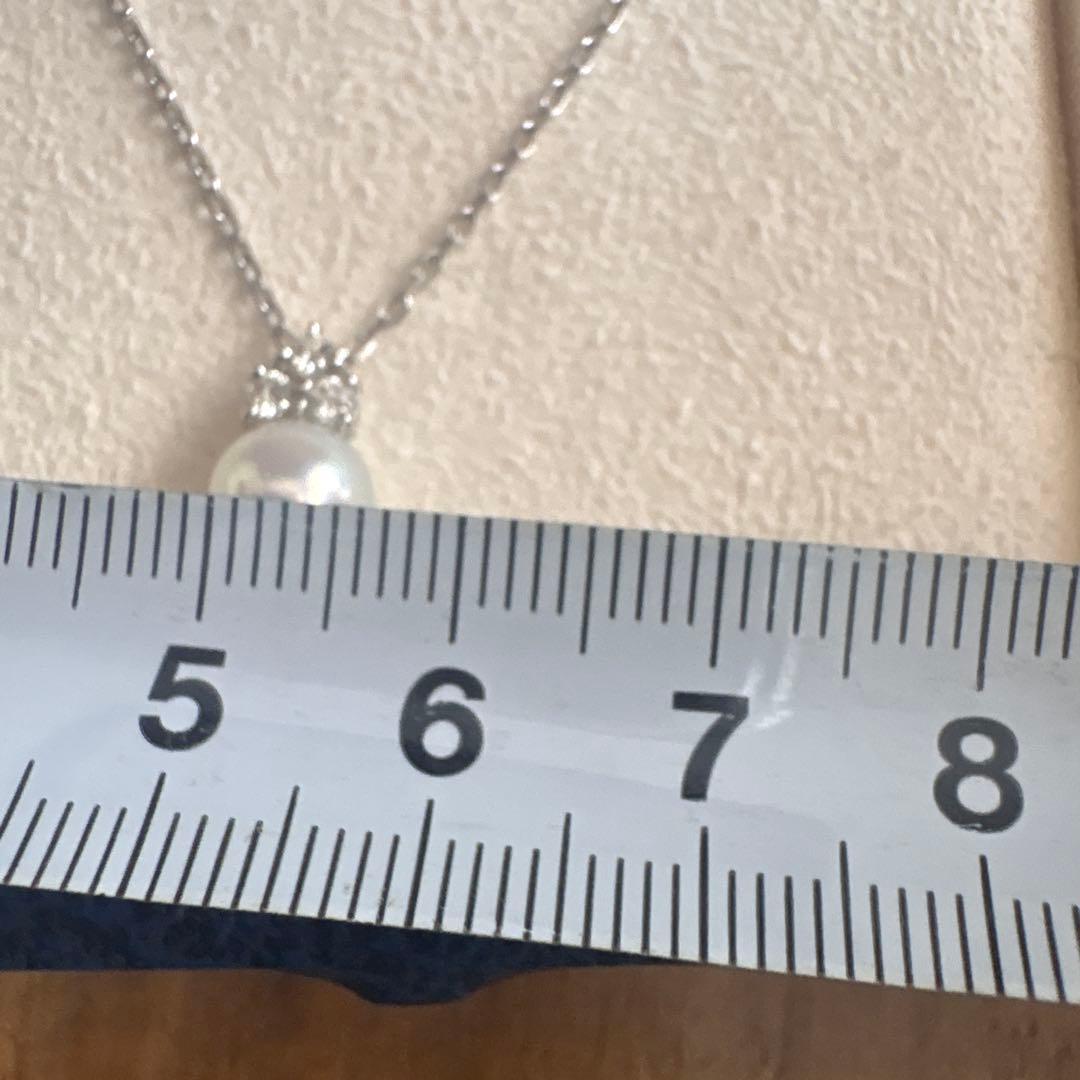 MIKIMOTO K18WG necklace with a single white pearl pendant on a delicate white gold chain