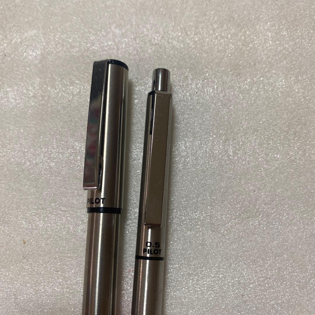 Pilot fountain pen and mechanical pencil set with sleek black barrels and silver accents