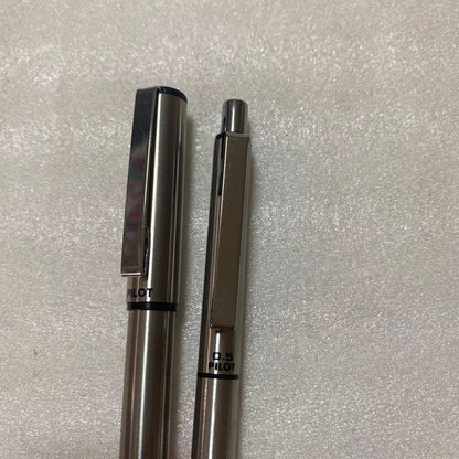 Pilot fountain pen and mechanical pencil set with sleek black barrels and silver accents