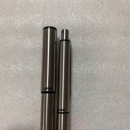 Pilot fountain pen and mechanical pencil set with sleek black barrels and silver accents